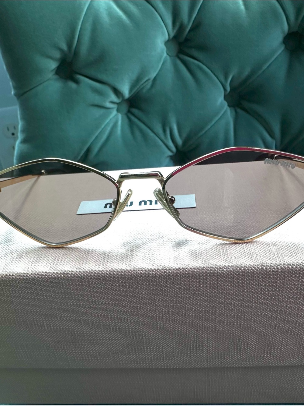 Miu Miu Gold Frame Sunglasses with Pink Lenses